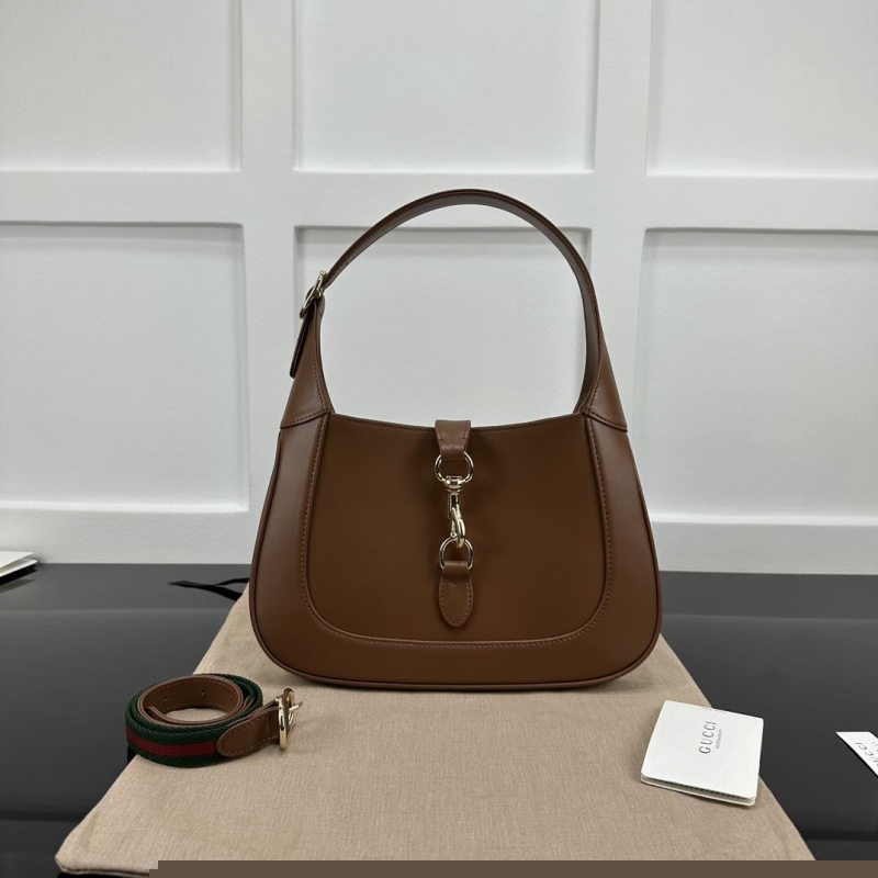 G*u*i top handle bags
